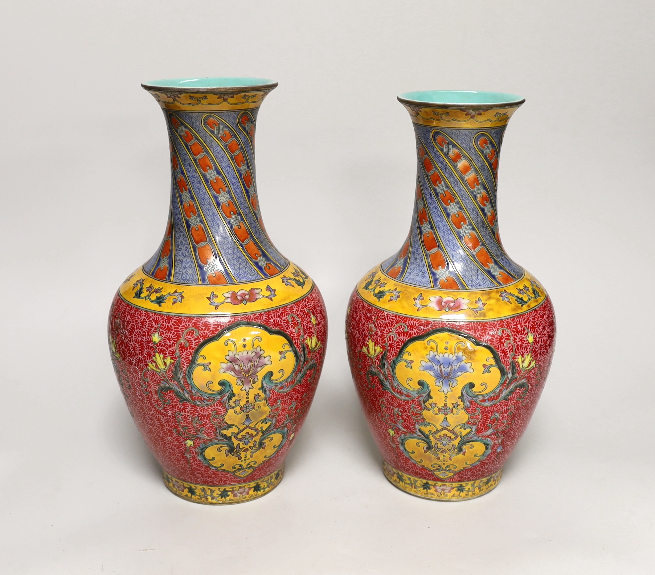 A pair of Chinese famille rose baluster vases, 29cm